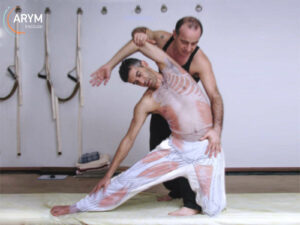 Advanced-Assisted-yoga-stretch_Gate-pose-assisted_Ayurvedic-Yoga-Massage-training ARYM